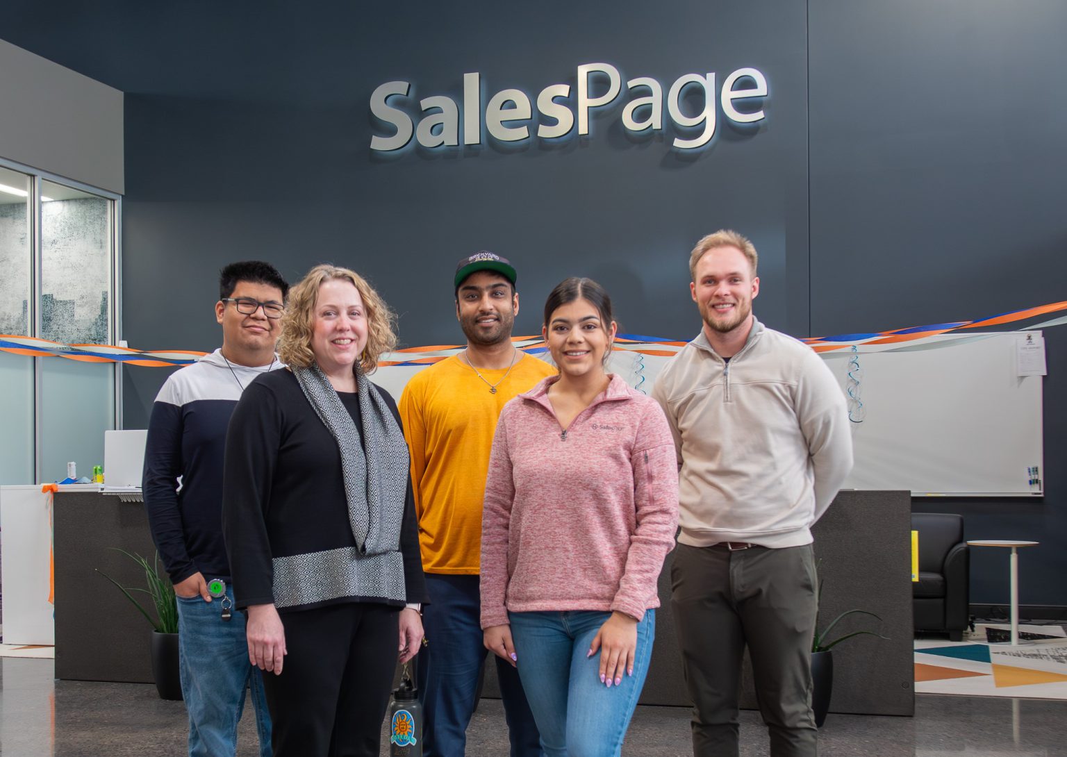 Haziel Cerroblanco ’28 (from left) is among the Kalamazoo College students who took advantage of spring break in March to job shadow at local businesses. As a bonus, his experience at SalesPage Technologies allowed him to network with four K alumni: Ana Evans ’02, Ranjeet Ghorpade ’15, Jasmin Murillo ’22 and Trevor Hunsanger ’22.