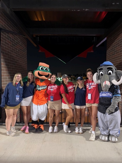 Students with baseball mascots