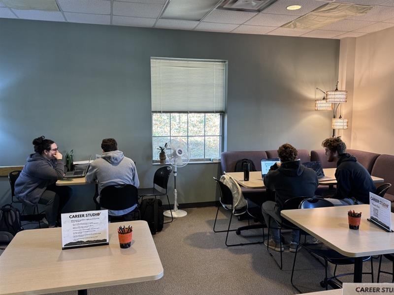 Students meeting with student career advisors in the Career Studio